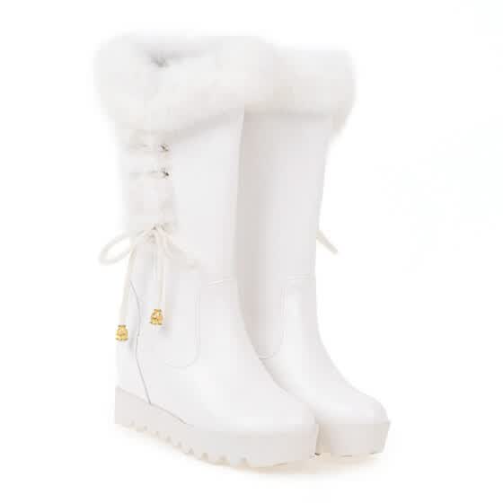 white fluffy boots