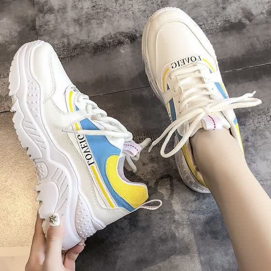 white thick soled tennis shoes