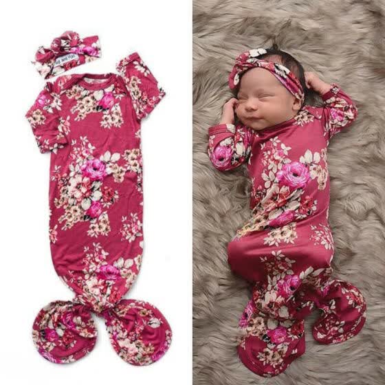 cute baby girl swaddles