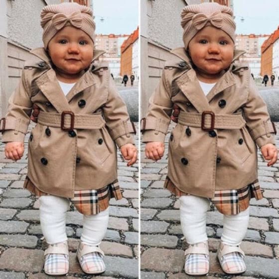 baby in a trenchcoat